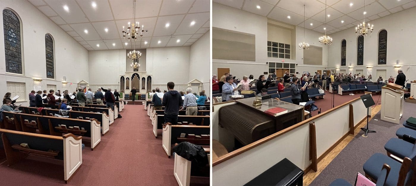 gourp4 Interior of a church with pews, a pulpit, and a congregation seated and listening to a speaker.